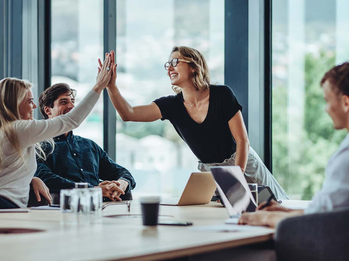 Colleagues celebrating success